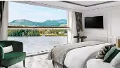 ?? ?? Left: A stateroom on Uniworld’s SS Victoria. Right: The indoor pool has views to outside.