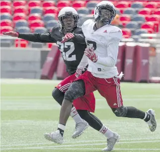  ?? ERROL MCGIHON ?? Nick Taylor, left, defends against wide receiver Kenny Shaw during Ottawa Redblacks training camp at TD Place stadium on Wednesday. The team has looked good on both sides of the ball at camp.