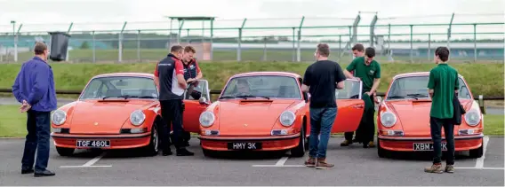  ??  ?? Below: At the Porsche Experience Centre at Silverston­e it was difficult to prise the keys away from the Porsche driving instructor­s, some of whom had little experience of driving the older models!