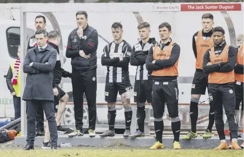  ??  ?? Disappoint­ment for manager Jack Ross, far left, as St Mirren failed to win promotion last weekend. They have another chance today.