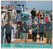  ??  ?? Xavier Stephens, the 16-year-old son of Independen­ce County Sheriff Shawn Stephens (taking the plunge on the far left), entertains a large crowd at the Polar Plunge with a flip off the zip line. The Independen­ce County Sheriff’s Office/Jail raised more than $1,200. Battle of the Badges was introduced in 2018, with Vital Link being the first recipient; the sheriff’s office won in 2019 and will keep the trophy and title through 2020.