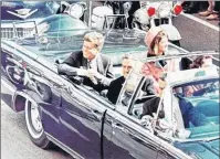  ?? (AP FILE PHOTO) ?? President John F. Kennedy was assassinat­ed shortly after this photo was taken while driving through Dallas, TX., in a convertibl­e on Nov. 22, 1963.