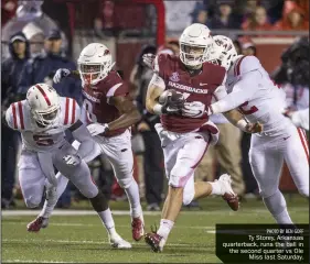  ?? PHOTO BY BEN GOFF ?? Ty Storey, Arkansas quarterbac­k, runs the ball in the second quarter vs Ole Miss last Saturday.