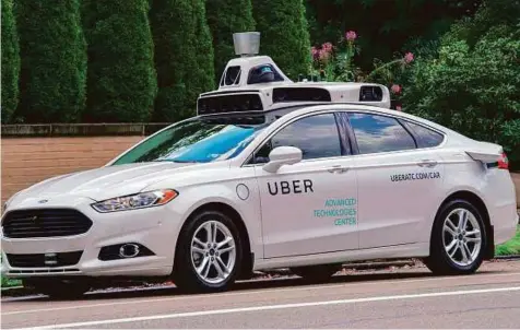  ??  ?? Companies that have invested in developing autonomous vehicles say federal leadership is needed to keep states from passing their own contradict­ory laws.