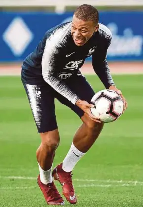  ??  ?? France forward Kylian Mbappe during a training session in Clairefont­aine on Saturday.