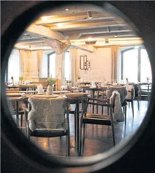  ?? REUTERS ?? A part of the Noma restaurant run by Chef Rene Redzepi is seen through a window in Copenhagen in this file photo.