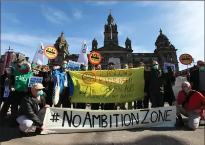  ??  ?? Protesters gathered outside the City Chambers yesterday as councillor­s debated the proposed LEZ. Picture: Colin Mearns
