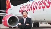  ?? PHOTO: PTI ?? CMD Ajay Singh unveiled the first freighter aircraft in New Delhi, on Monday, and hinted at fare hikes in passenger services