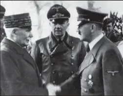  ?? FOTO RR ?? Pétain tijdens een ontmoeting met Hitler.