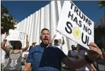  ??  ?? Anti-Equinox protesters in Los Angeles