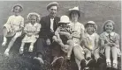  ??  ?? Outing: Prouse family and three wartime evacuees in the Forties