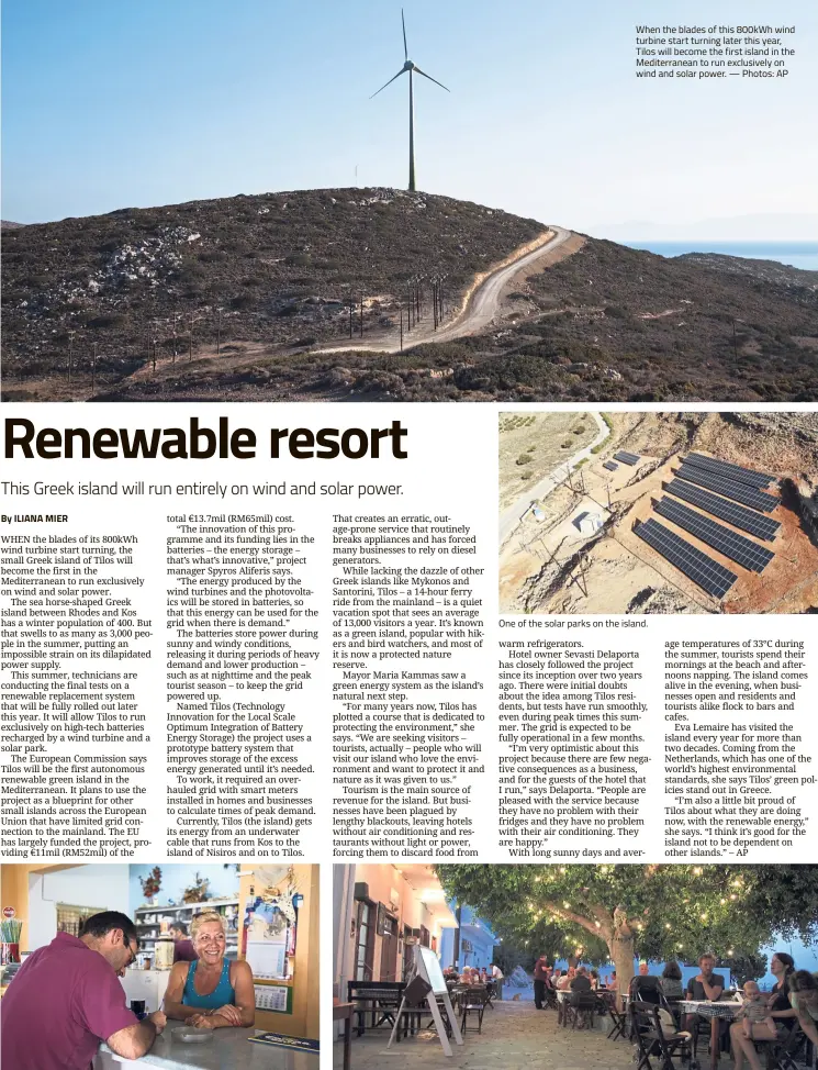  ??  ?? Locals are happy with the promise of a steady power supply for their businesses. When the blades of this 800kWh wind turbine start turning later this year, Tilos will become the first island in the Mediterran­ean to run exclusivel­y on wind and solar power. — Photos: AP One of the solar parks on the island. Everyone, locals and tourists alike, flock to cafes, bars and restaurant­s in the evenings, so not having power to run refrigerat­ion and lights can affect business.