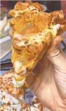  ?? KARA VANDOOIJEW­EERT ?? Paneer Tikka Pizza at LaZeez by Dhaba.