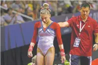 ?? NEW YORK TIMES ?? Ashton Locklear, left, and her coach, Qi Han, at the 2016 U.S. Olympic Trials in 2016. Several athletes, including Locklear, have come forward with accusation­s against Han, describing patterns of emotional and physical abuse.