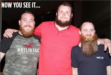  ??  ?? Eoin McMahon, Paddy Murphy and Shane O’Neill before their shave for charity.