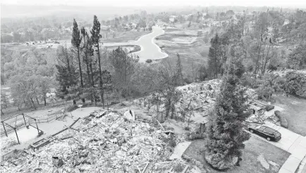  ?? HUNG T. VU/USA TODAY NETWORK ?? Homes in the Salt Creek Heights subdivisio­n of Redding, Calif., have been reduced to ashes.