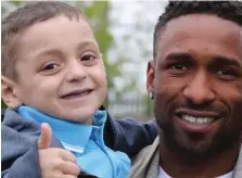  ??  ?? Jermain Defoe with Bradley Lowery, and left, playing for Rangers