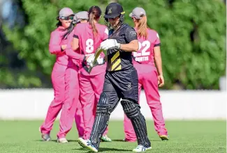  ?? GETTY IMAGES ?? Northern Spirit players celebrate the dismissal of Wellington star Sophie Devine at Lincoln yesterday.