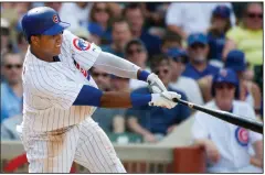  ?? (AP file photo) ?? Starlin Castro of the Chicago Cubs hit a three-run home run in his first major-league at-bat on this date in 2010 and drove in a record six runs in a 14-7 victory over the Cincinnati Reds.