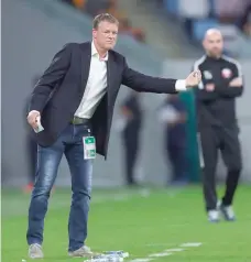  ?? — Reuters ?? Oman coach Erwin Koeman gestures during the match.