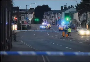  ??  ?? ●● A police cordon was in place on London Road for several hours