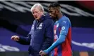  ?? Photograph: John Walton/PA ?? Roy Hodgson, left, speaks to Wilfried Zaha during their first spell together at Palace. The Ivory Coast internatio­nal will again be crucial to their hopes of staying up.