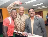  ??  ?? University of the West Indies (UWI) Vice Chancellor Sir Hilary Beckles (centre), West Indies cricketer Rovman Powell (left), and Dr Akshai Mansingh, dean of the new Faculty of Sport, at the recent launch of the faculty at the UWI Regional Headquarte­rs.