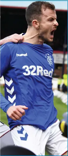  ??  ?? Andy Halliday celebrates with Kyle Lafferty after levelling the score for Rangers against Dundee