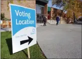  ?? BEN VERKERK/The Okanagan Weekend ?? People walk past Kelowna’s Parkinson Recreation Centre, Friday’s advance poll location for the civic elections. The centre is one of a dozen places to vote in Kelowna’s elections today.