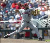  ?? JOHN PETERSON — THE ASSOCIATED PRESS ?? Arkansas starting pitcher Connor Noland (13) throws a pitch against Stanford in the first inning during an NCAA College World Series baseball game Saturday in Omaha, Neb.