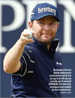  ?? PHOTO AFP ?? Branden Grace était tellement concentré qu’il n’a su qu’à la fin de sa ronde qu’il venait d’établir un record, lorsque son cadet le lui a annoncé.