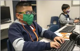  ?? LM OTERO — THE ASSOCIATED PRESS FILE ?? Students work on computers at Tibbals Elementary School in Murphy, Texas.