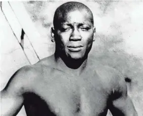  ?? AP ?? Jack Johnson, the first black heavyweigh­t boxing champion, was forced into exile and then imprisoned because of racially motivated charges.