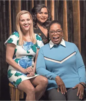  ?? DAN MACMEDAN/USA TODAY ?? Reese Witherspoo­n, Mindy Kaling and Oprah Winfrey are the three astral guides in “A Wrinkle in Time,” in theaters Friday. Director Ava DuVernay adaptated the 1962 sci-fi novel for the 21st century.