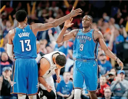  ?? [PHOTO BY BRYAN TERRY, THE OKLAHOMAN] ?? Paul George, left, has a free-agent decision to make that could impact the one Thunder teammate Jerami Grant faces.