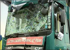  ??  ?? Smashed: Impact damage to the bin lorry’s windscreen