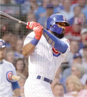  ?? AP ?? Jason Heyward smacks an RBI single during the Cubs’ five- run fifth inning Thursday.