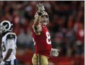  ?? NHAT V. MEYER — BAY AREA NEWS GROUP ?? The 49ers’ George Kittle celebrates his first down catch against the Los Angeles Rams in the second quarter at Levi’s Stadium on Dec. 21.