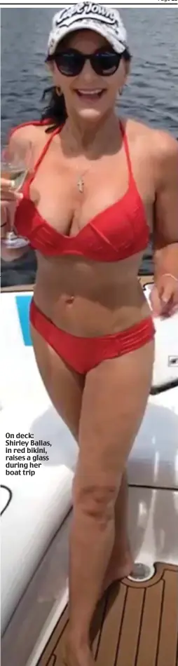  ??  ?? On deck: Shirley Ballas, in red bikini, raises a glass during her boat trip