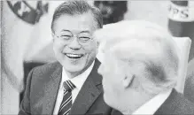  ?? POOL GETTY IMAGES ?? South Korean President Moon Jae-in reacts as President Donald Trump speaks during a meeting at the White House on Tuesday.