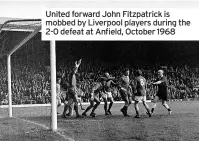  ??  ?? United forward John Fitzpatric­k is mobbed by Liverpool players during the 2-0 defeat at Anfield, October 1968
