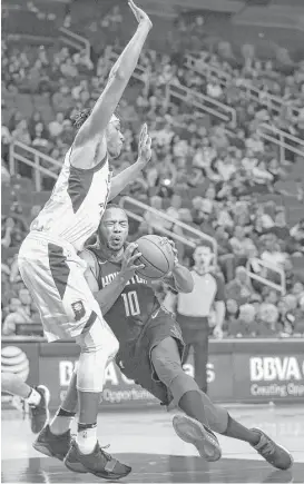  ?? Yi-Chin Lee / Houston Chronicle ?? Rockets guard Eric Gordon runs into problems in the form of the Pacers’ Myles Turner during a victory last week in which Gordon was limited to 10 points.