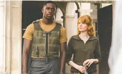  ?? JONATHAN PRIME / NETFLIX ?? Damson Idris stars as Harp and Emily Beecham is Sofiya
in the very generic action flick Outside the Wire.