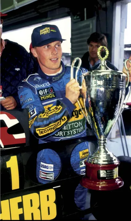  ??  ?? Until he was confirmed at Benetton for 1995, as reigning champion Michael Schumacher’s team-mate, it seemed that Johnny Herbert’s F1 career was destined to fizzle out. That all changed at Silverston­e that season. Schumacher was leading but tangled with Damon Hill on lap 46 and Herbert picked up the pieces for a very popular first F1 win