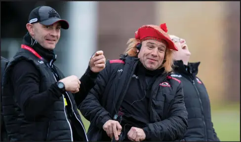  ??  ?? Richard Cockerill brings some fun to Edinburgh’s training yesterday as he sports a ‘See you, Jimmy’ hat following Scotland’s shock win over England