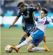  ?? DARRYL DYCK/ THE CANADIAN PRESS ?? The Impact’s Maxim Tissot, right, gets in the way of the Whitecaps’ Sebastian Fernandez during Wednesday’s game.
