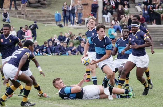  ?? Photo: Stephen Penney ?? Charlie Flemming of St Andrew’s College 1st rugby side prepares to make a pass during his sides FNB Classic Clash derby against Graeme College 1sts. St Andrew’s won 25-10. View more derby photos on page 25.