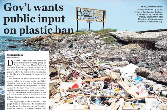  ?? IAN ALLEN/PHOTOGRAPH­ER ?? Garbage washed up on the shore of the Kingston Harbour by the sign along the Michael Manley Boulevard in east Kingston, which welcomes everyone to the capital city.