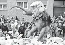  ?? THOMAS LOHNES, GETTY IMAGES ?? A carnival float featuring President Trump in a parade in Mainz, Germany, last month.