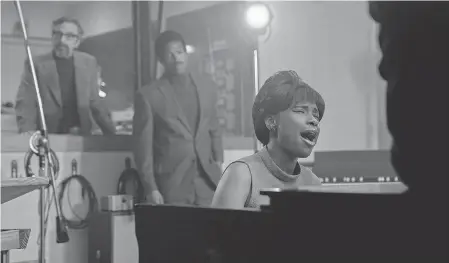  ?? PROVIDED BY QUANTRELL D. COLBERT ?? Aretha Franklin ( Jennifer Hudson) sings as music producer Jerry Wexler ( Marc Maron) and her husband Ted White ( Marlon Wayans) listen in the biopic “Respect.”